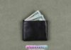 a wallet with less money